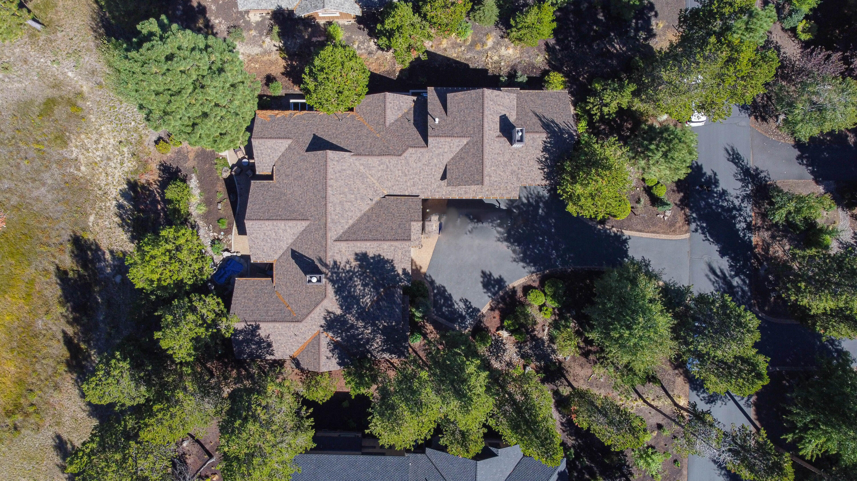 56689 Dancing Rock Loop Bend, OR 97707 - Photo 45 of 51 an aerial view of multiple house with outdoor space