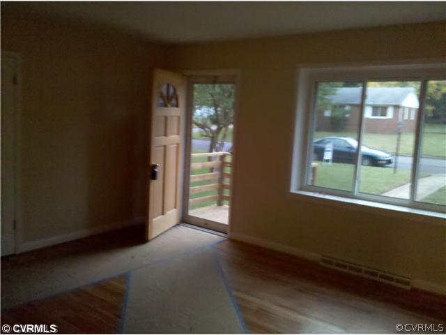 Living Room - Fresh Paint and Newly refinished har
