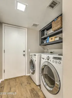 a view of washer and dryer in a utility room