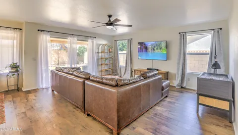 a kitchen with stainless steel appliances granite countertop a stove and a refrigerator