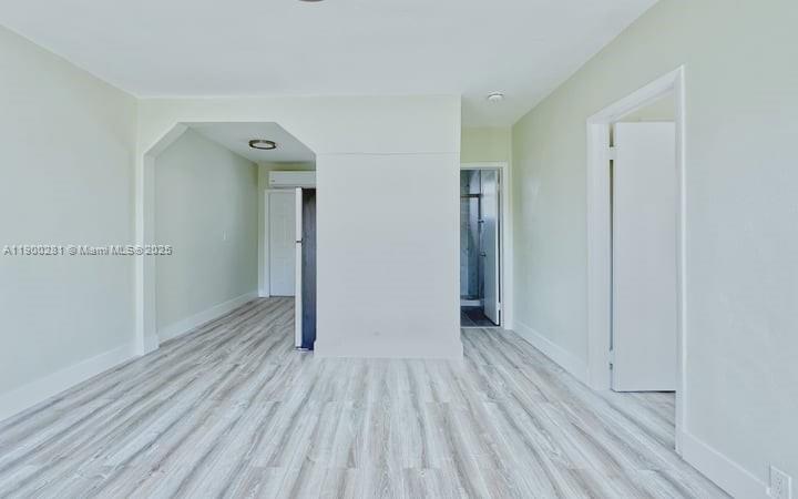 1010 Opa-locka Boulevard, Unit 2 Opa-Locka, FL 33054 - Photo 2 of 13 wooden floor in an empty room