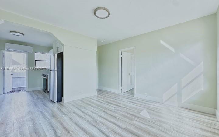 1010 Opa-locka Boulevard, Unit 2 Opa-Locka, FL 33054 - Photo 3 of 13 a view of empty room with wooden floor