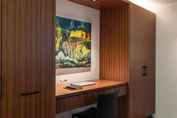 a view of a livingroom with furniture and window