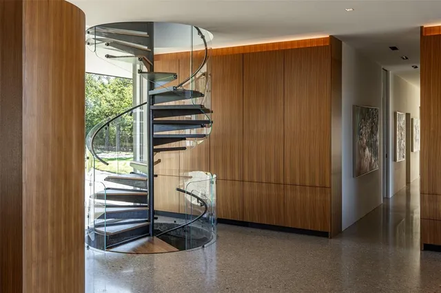 a room that has a bed and a window