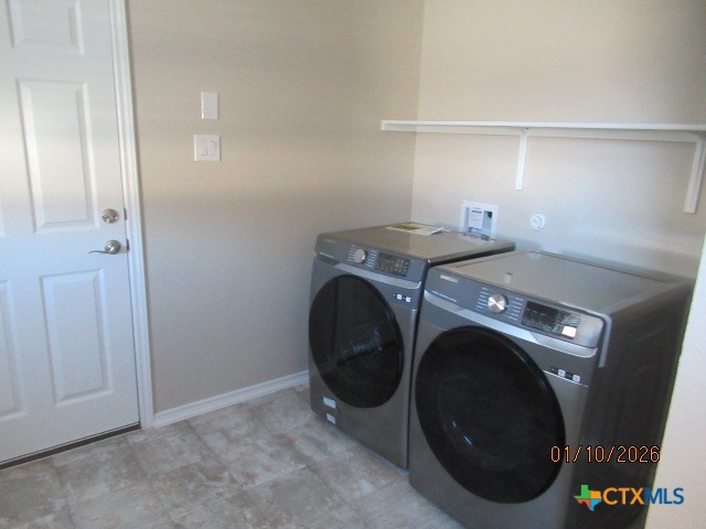 195 Azure Cove Kyle, TX 78640 - Photo 12 of 36 a utility room with dryer and washer