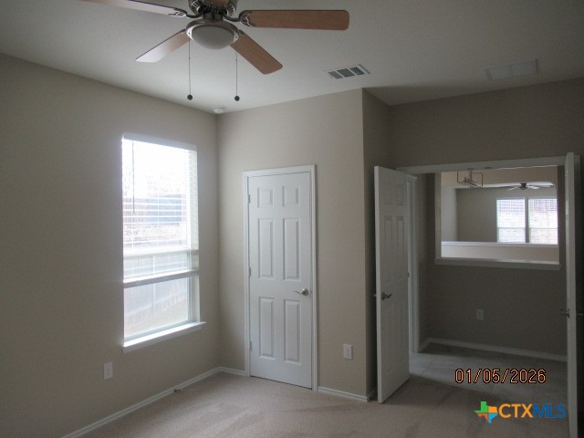 195 Azure Cove Kyle, TX 78640 - Photo 4 of 36 a view of an empty room with a window