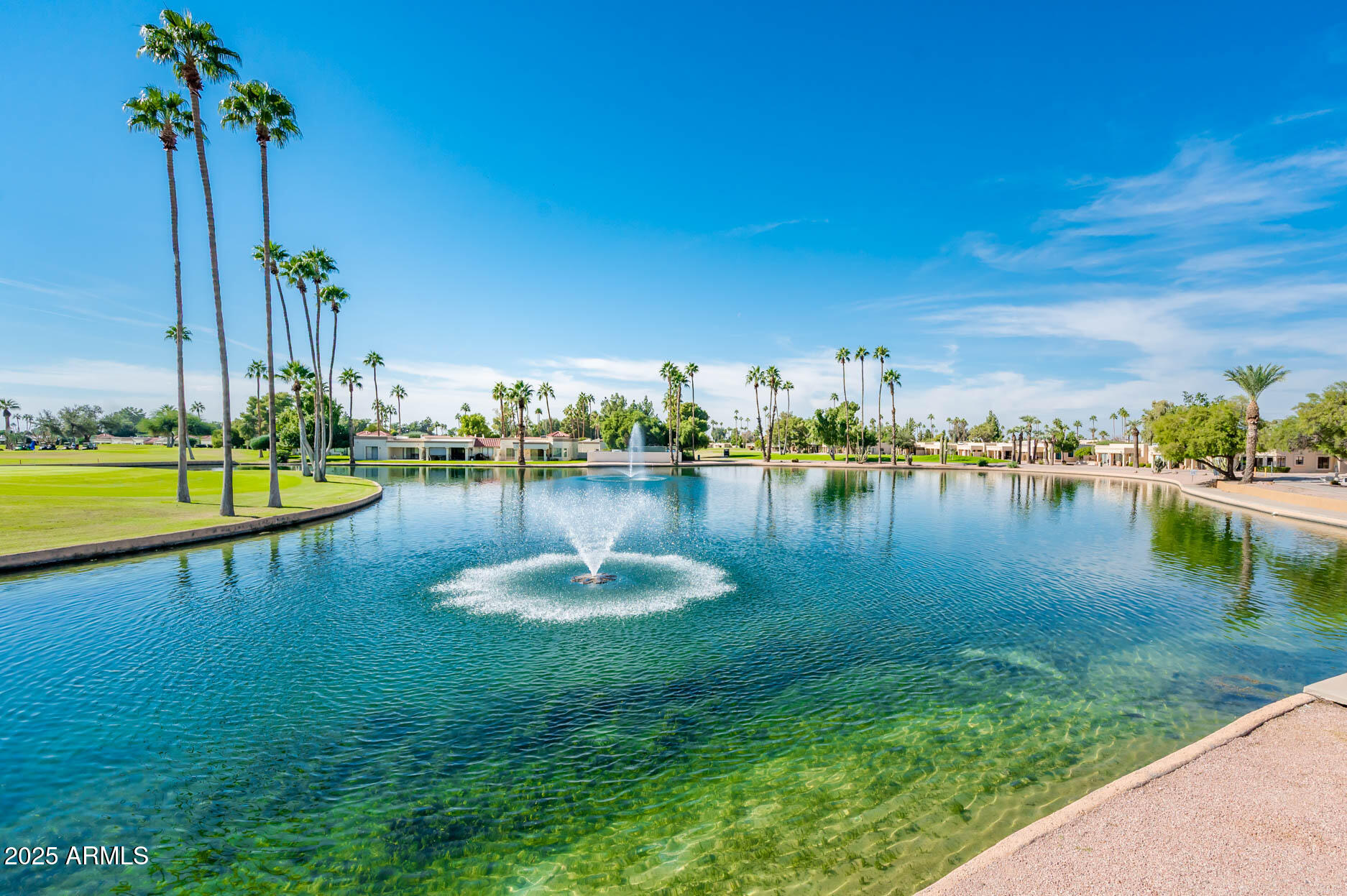 538 South 76th Place Mesa, AZ 85208 - Photo 36 of 50 a view of a lake with houses in the back