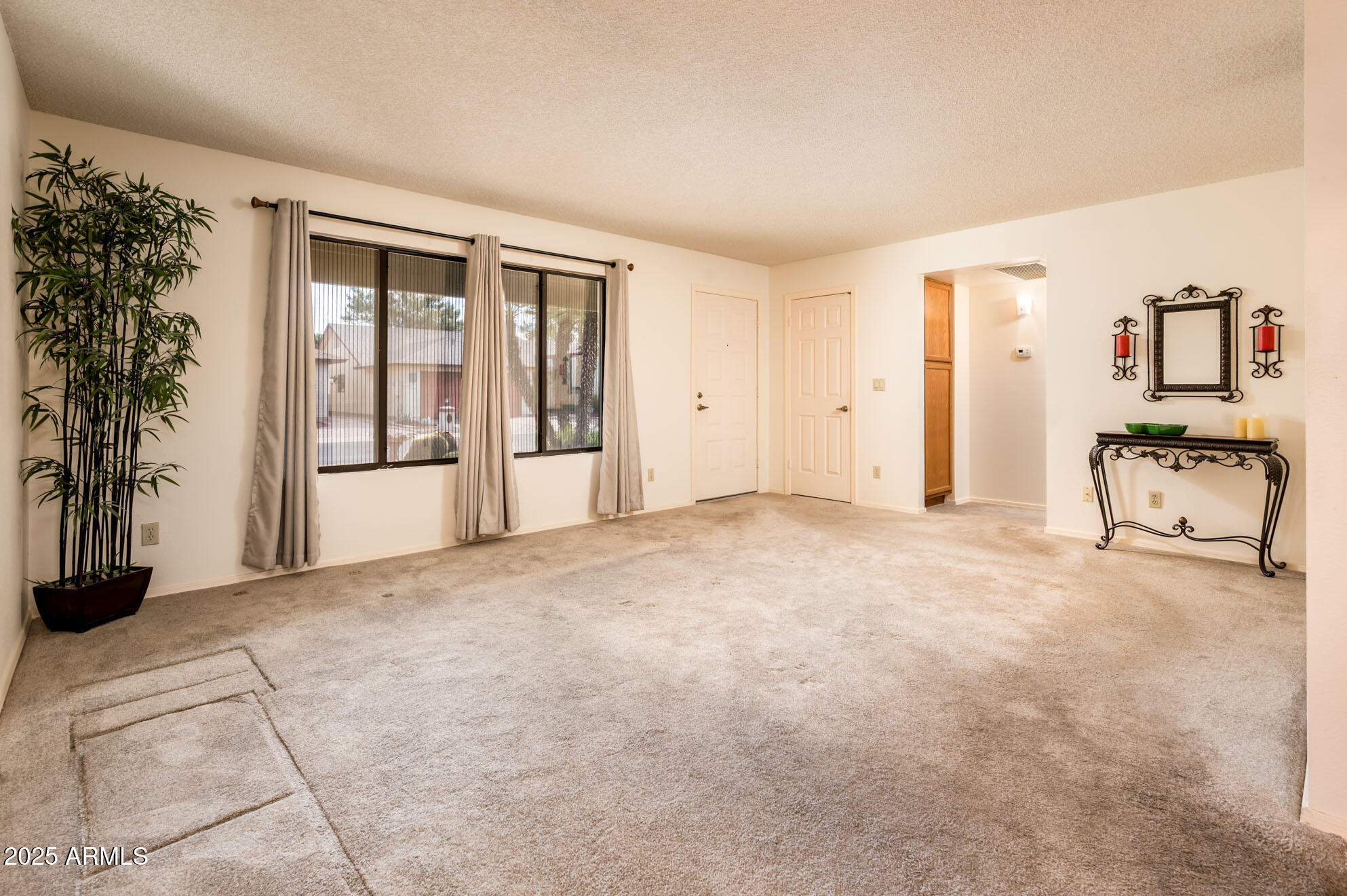 538 South 76th Place Mesa, AZ 85208 - Photo 5 of 50 a view of an empty room with a window