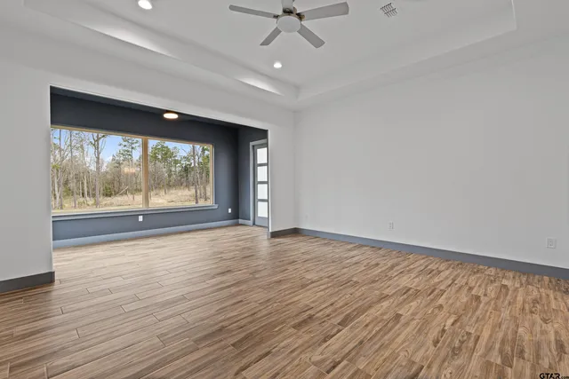 a bathroom with a tub and a sink