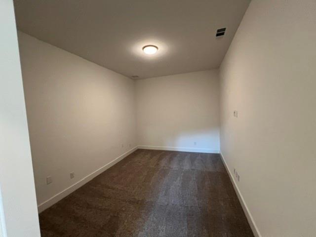 1407 Cartona Road Fate, TX 75087 - Photo 7 of 21 Carpeted interior room featuring neutral wall finishes and white baseboards