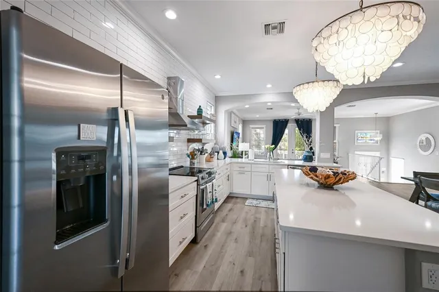 a kitchen with a stove and a sink