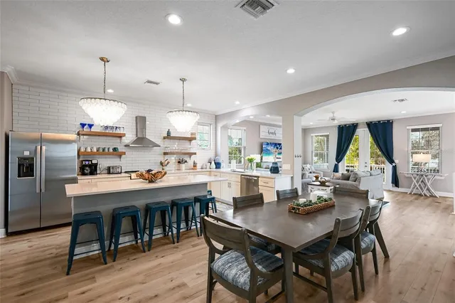 a bathroom with a sink a mirror and shower