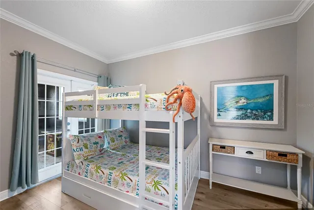 a bathroom with double vanity sinks and a mirror