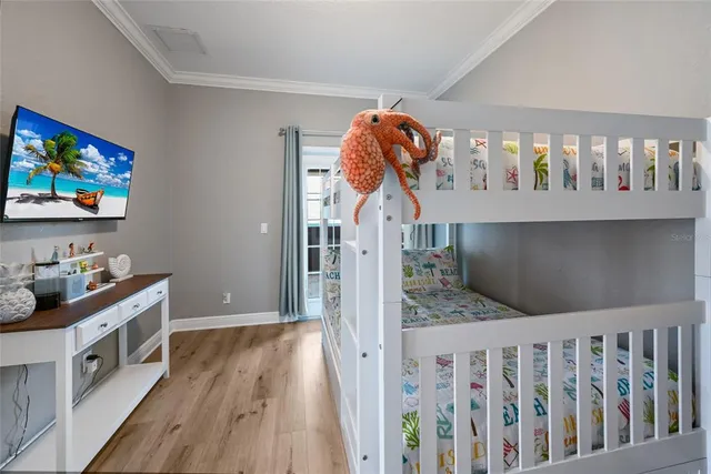 a bathroom with bathtub and window