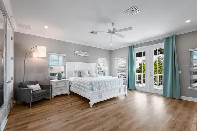 a bedroom with furniture and a window