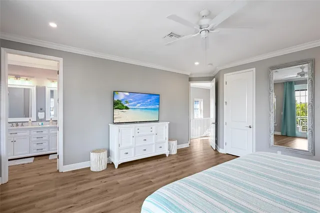 a bathroom with a granite countertop sink mirror and a shower