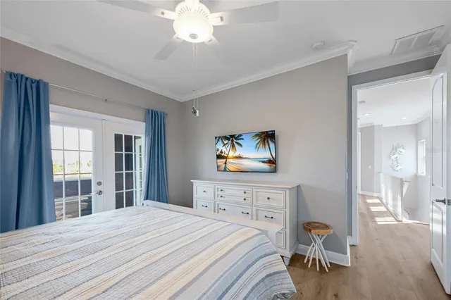 a front view of a house with swimming pool garden and patio