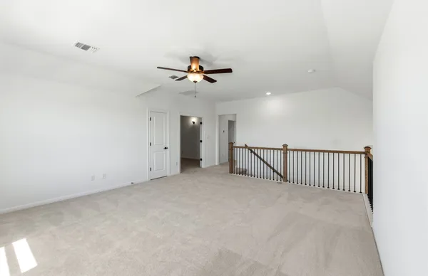 a view of a room with racks on the wall