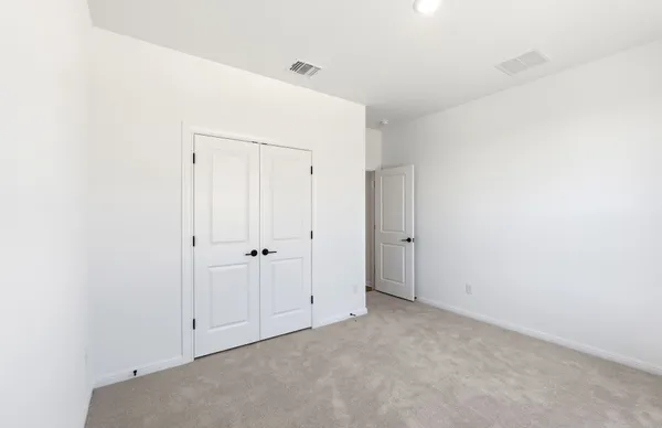 a view of small space with racks on the wall