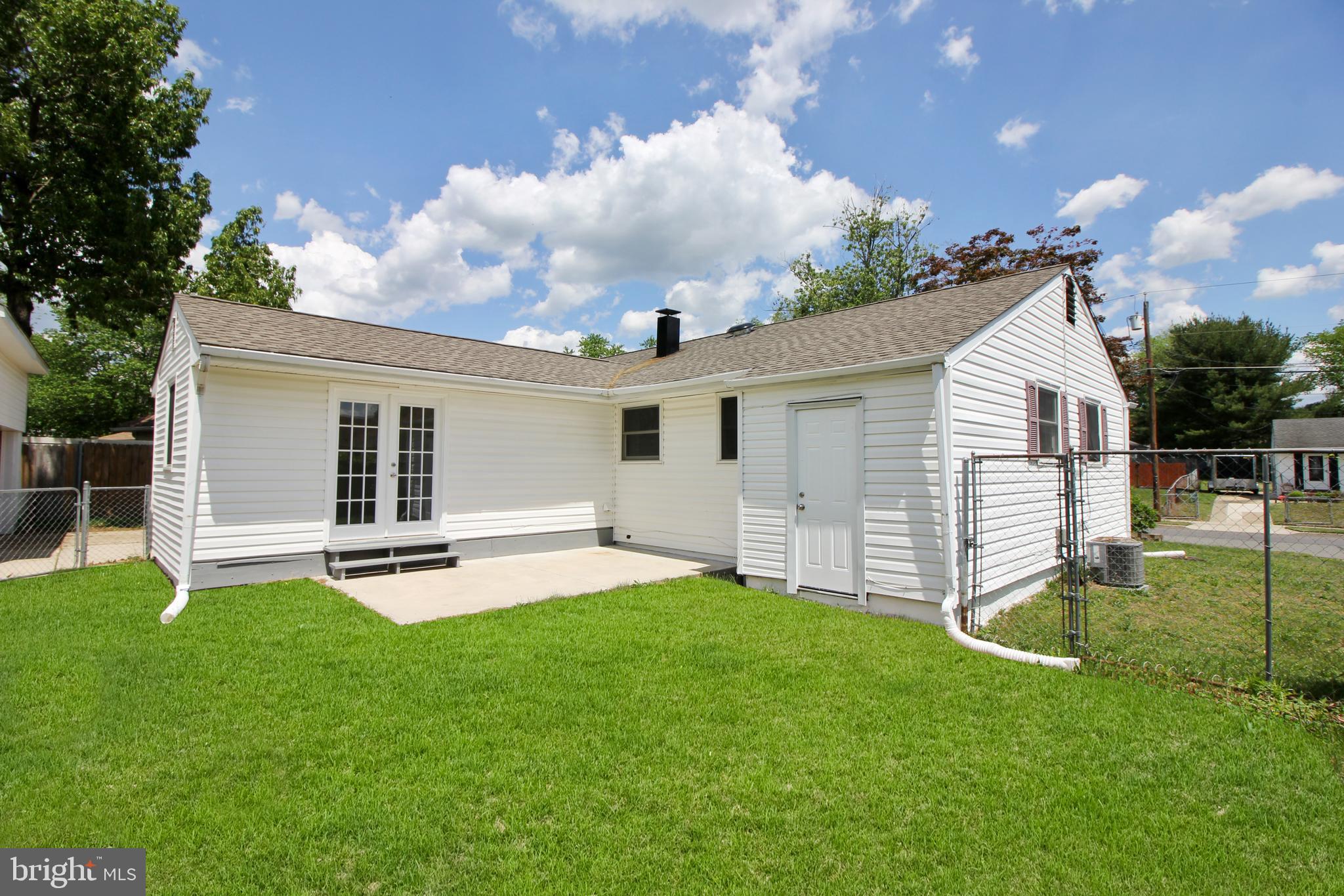 12 Estate Road Lumberton, NJ 08048 - Photo 29 of 30 a backyard of a house with table and chairs