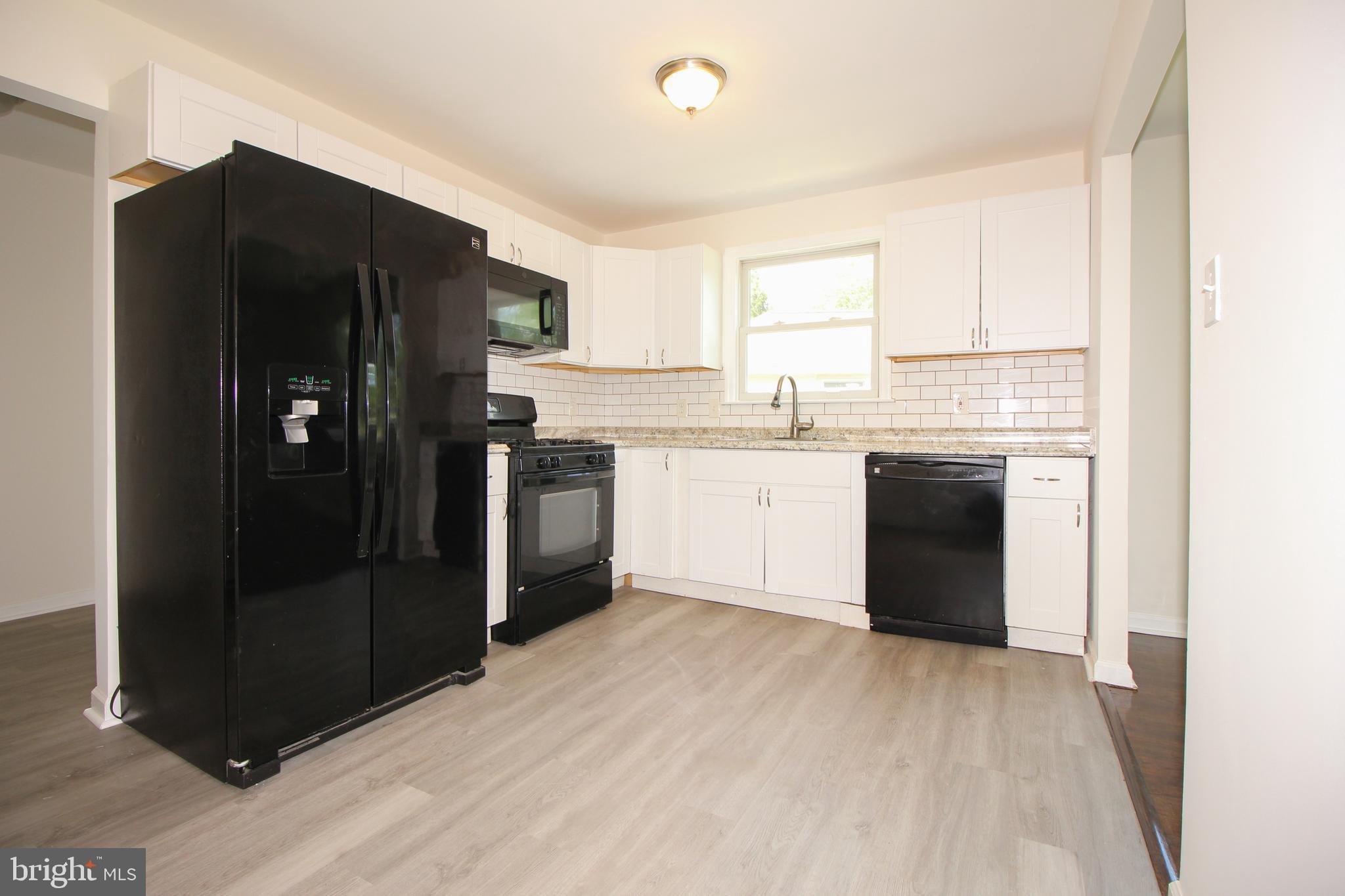 12 Estate Road Lumberton, NJ 08048 - Photo 7 of 30 a kitchen with stainless steel appliances granite countertop a refrigerator and a sink