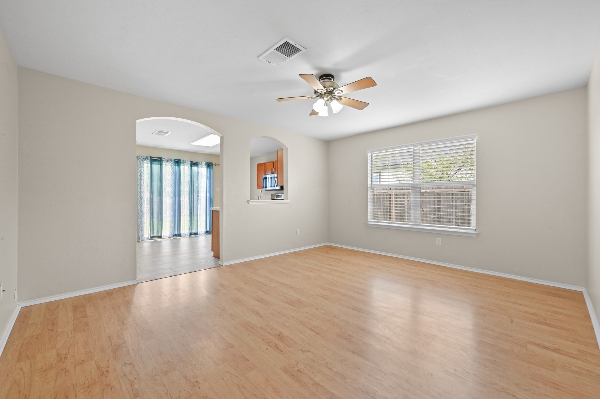 112 Mason Reed Cove Kyle, TX 78640 - Photo 4 of 26 a view of an empty room with a window