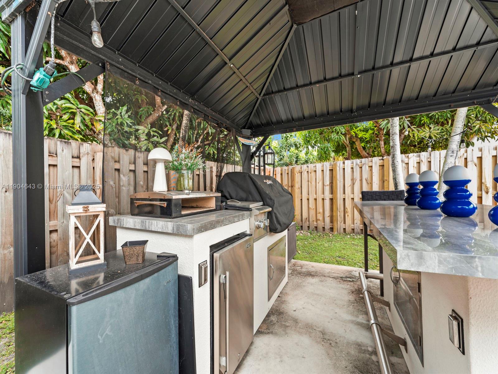12825 Southwest 107th Terrace Miami, FL 33186 - Photo 38 of 43 a view of outdoor kitchen