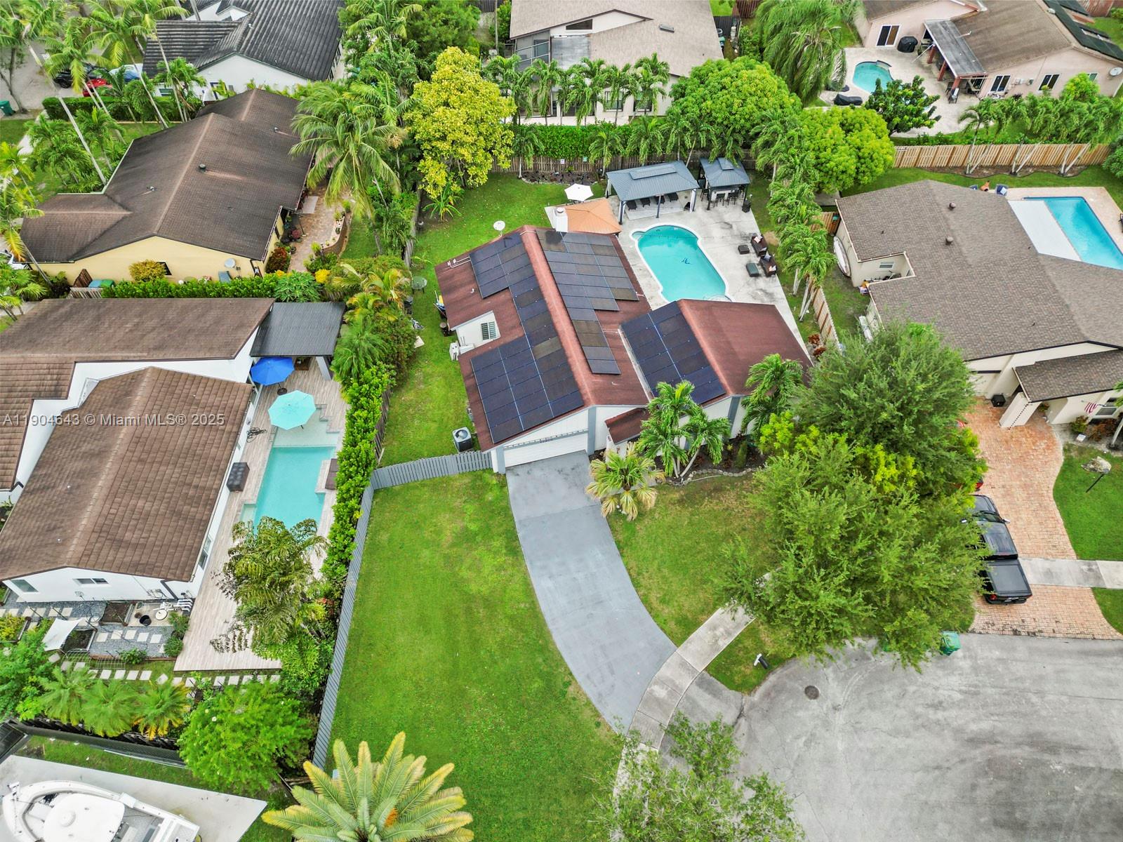 12825 Southwest 107th Terrace Miami, FL 33186 - Photo 42 of 43 an aerial view of a house with a garden