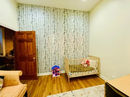 a living room with furniture and a couch
