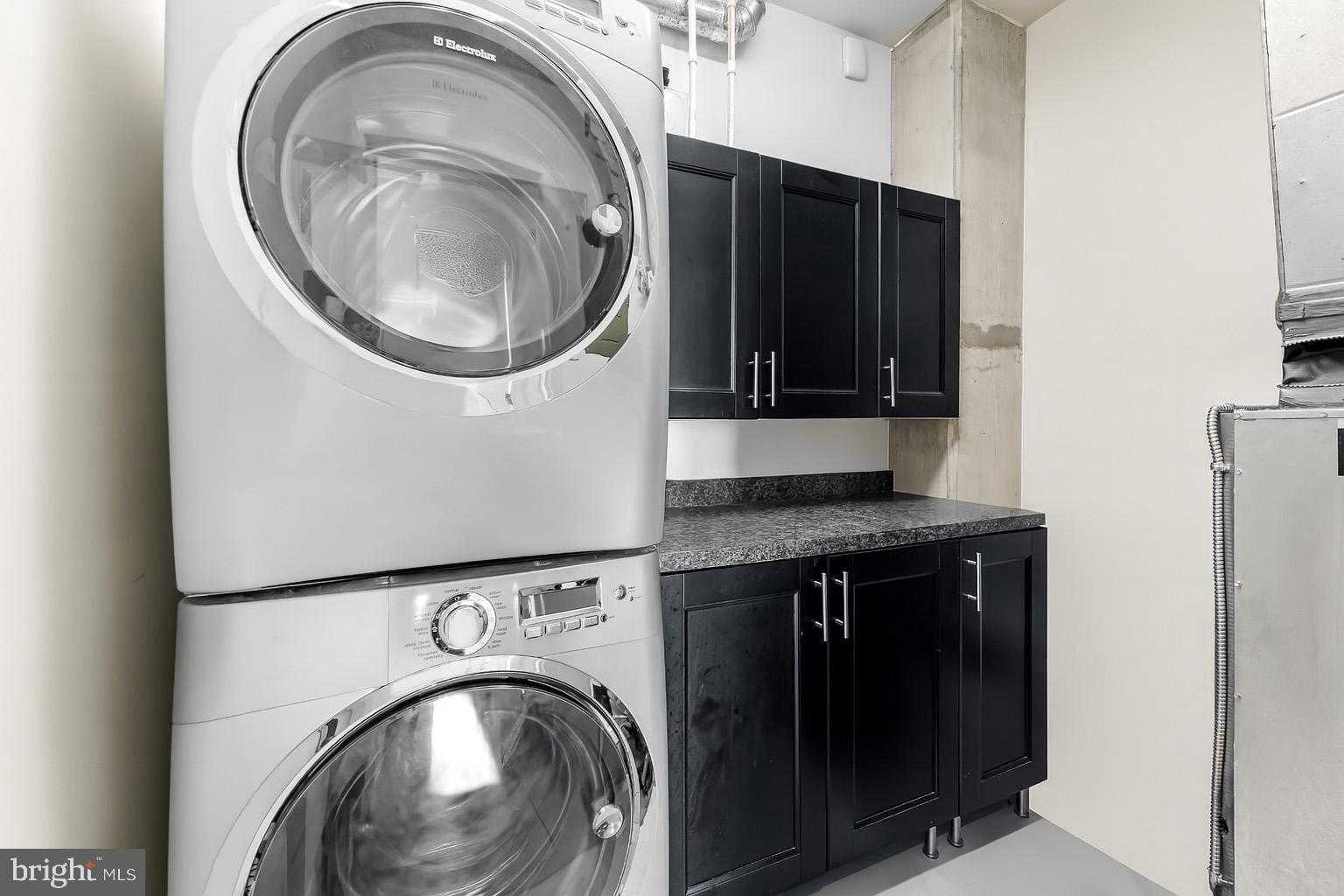 1200 Steuart Street, Unit 912 Baltimore, MD 21230 - Photo 19 of 45 Spacious laundry w/ updated appliances