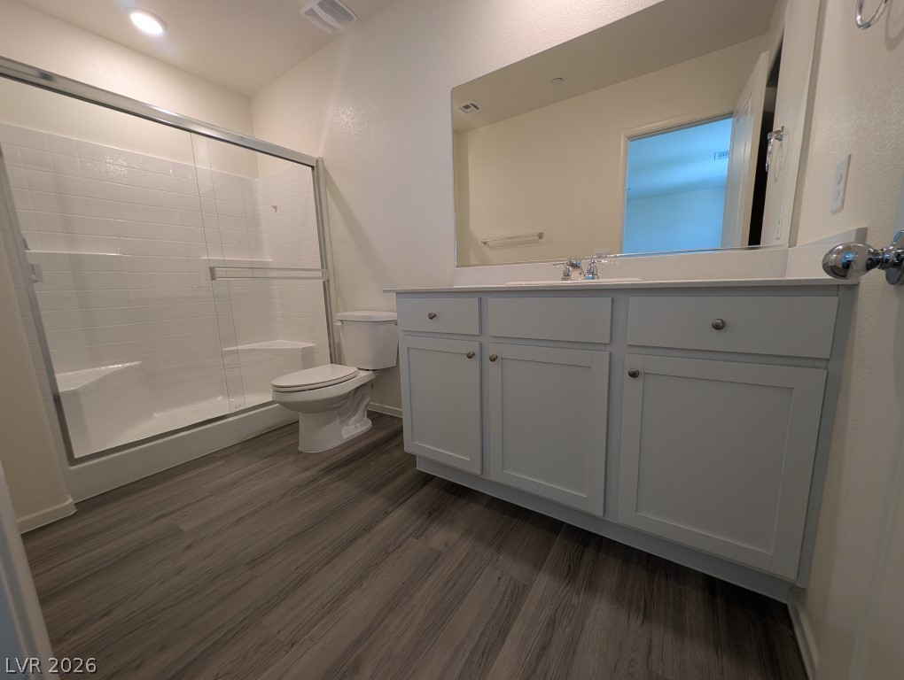 4820 Orchid Rdg Avenue Las Vegas, NV 89141 - Photo 19 of 27 Modern bath with spacious walk-in shower and ample vanity storage.
