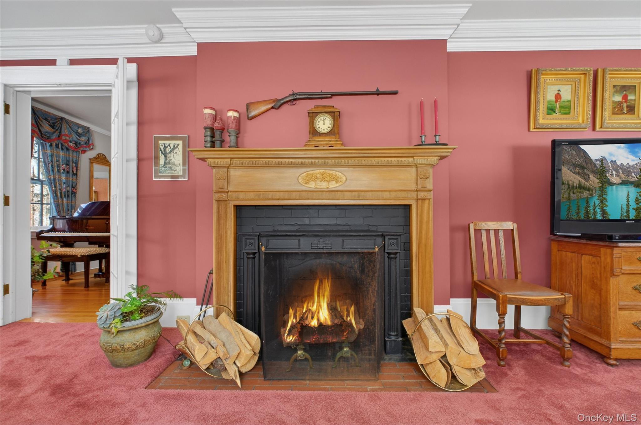 79 Old Balmville Road Newburgh, NY 12550 - Photo 12 of 45 a living room with furniture and a fireplace