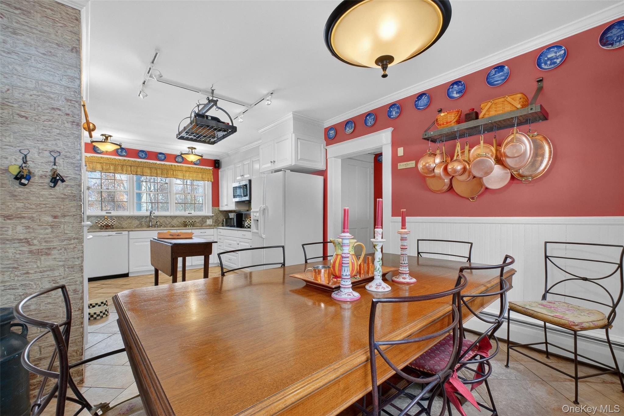 79 Old Balmville Road Newburgh, NY 12550 - Photo 17 of 45 a view of a dining room with furniture and chandelier