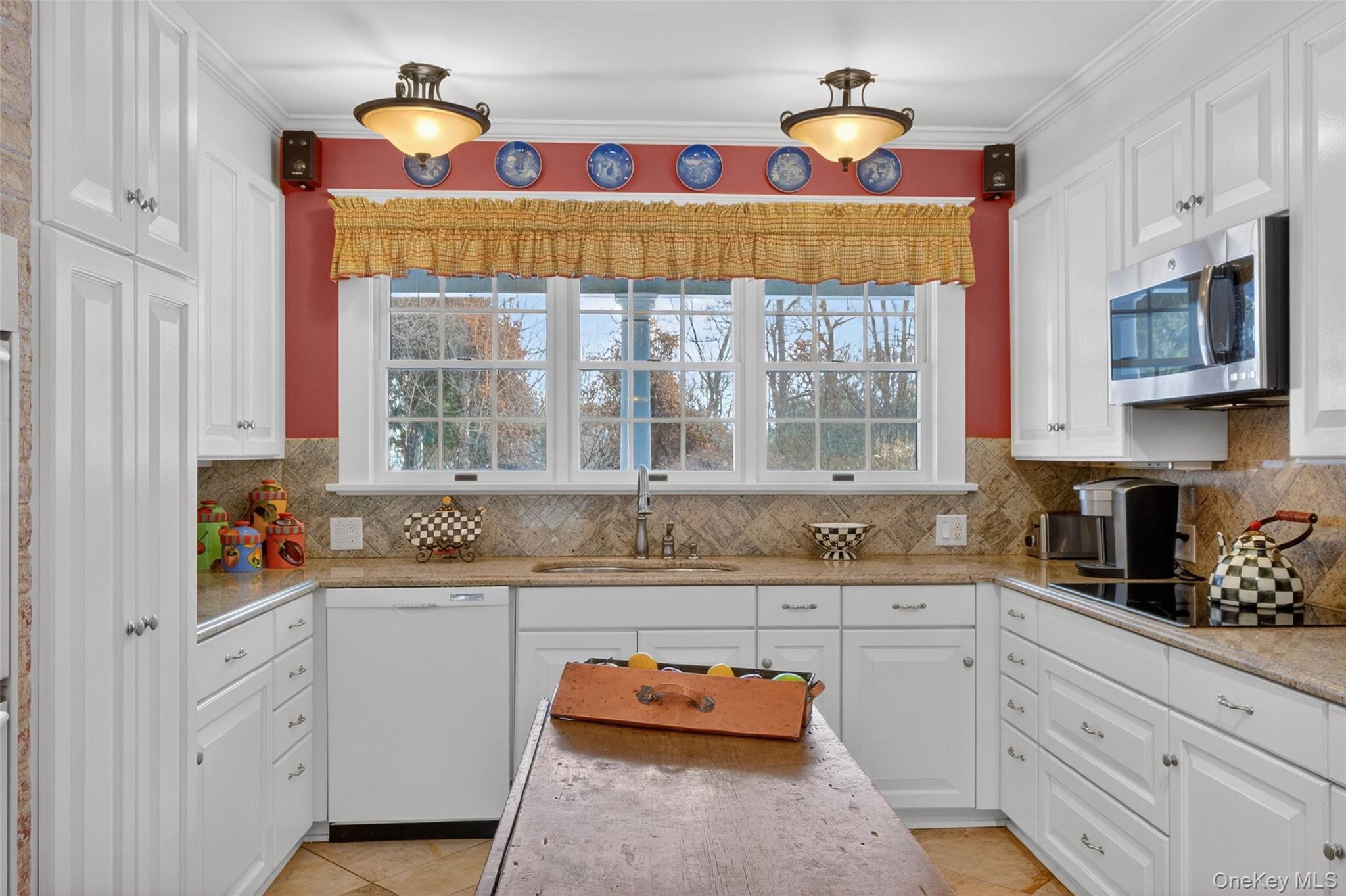 79 Old Balmville Road Newburgh, NY 12550 - Photo 19 of 45 a kitchen that has a sink and a stove