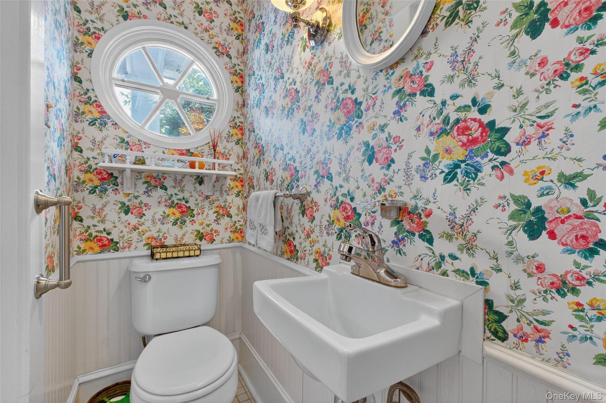 79 Old Balmville Road Newburgh, NY 12550 - Photo 22 of 45 a bathroom with a sink mirror vanity and toilet