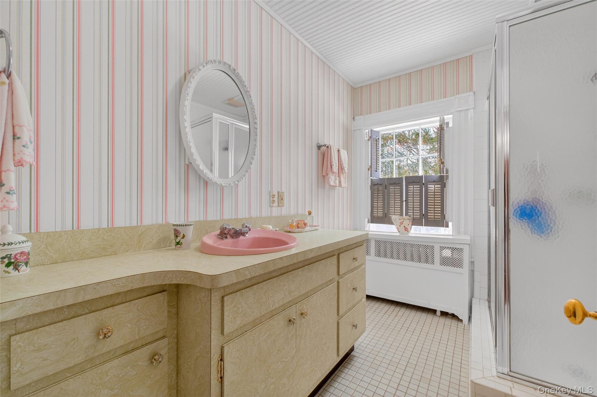 79 Old Balmville Road Newburgh, NY 12550 - Photo 30 of 45 a bathroom with a sink and a mirror