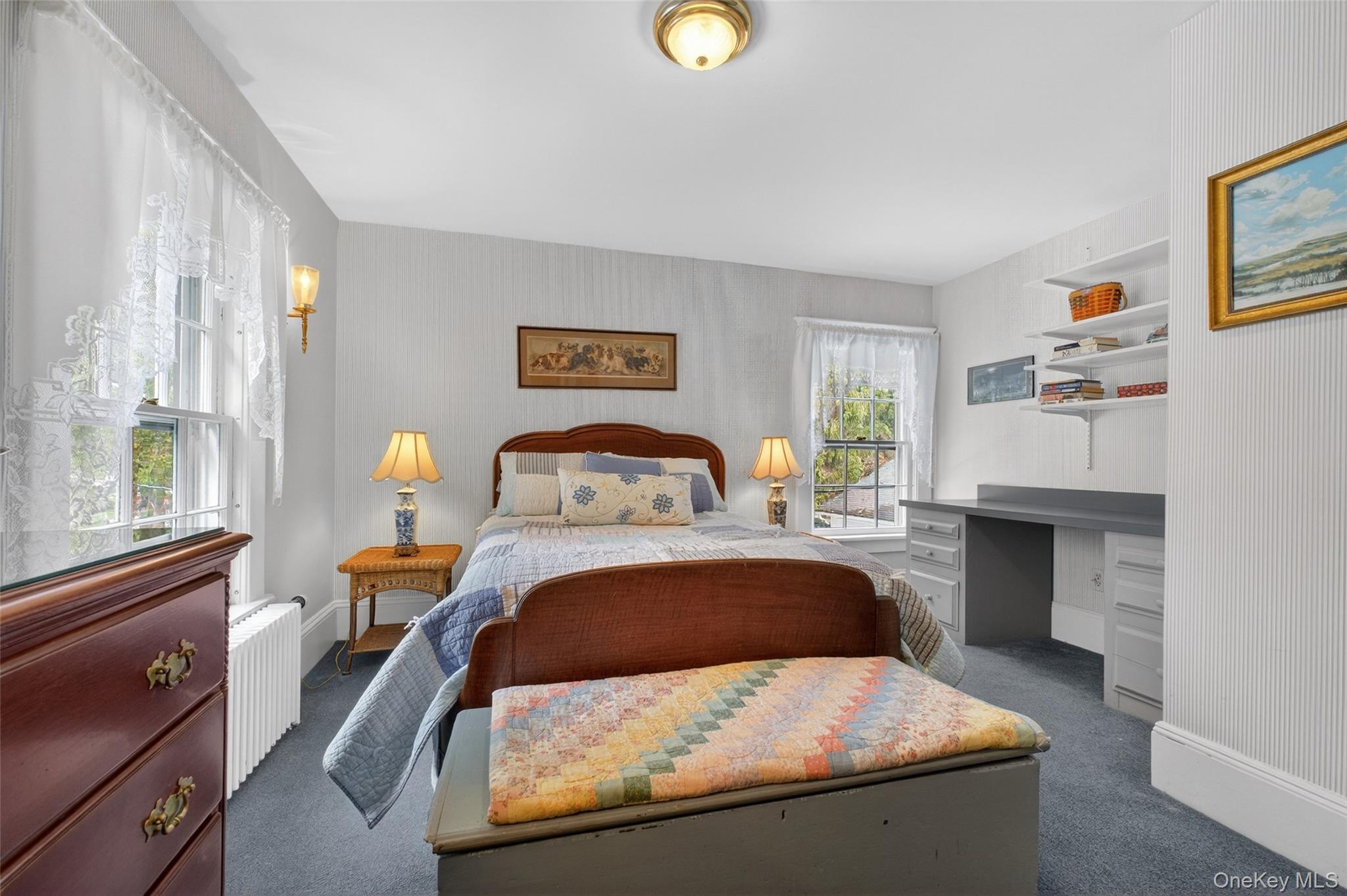 79 Old Balmville Road Newburgh, NY 12550 - Photo 32 of 45 a bedroom with a bed and window