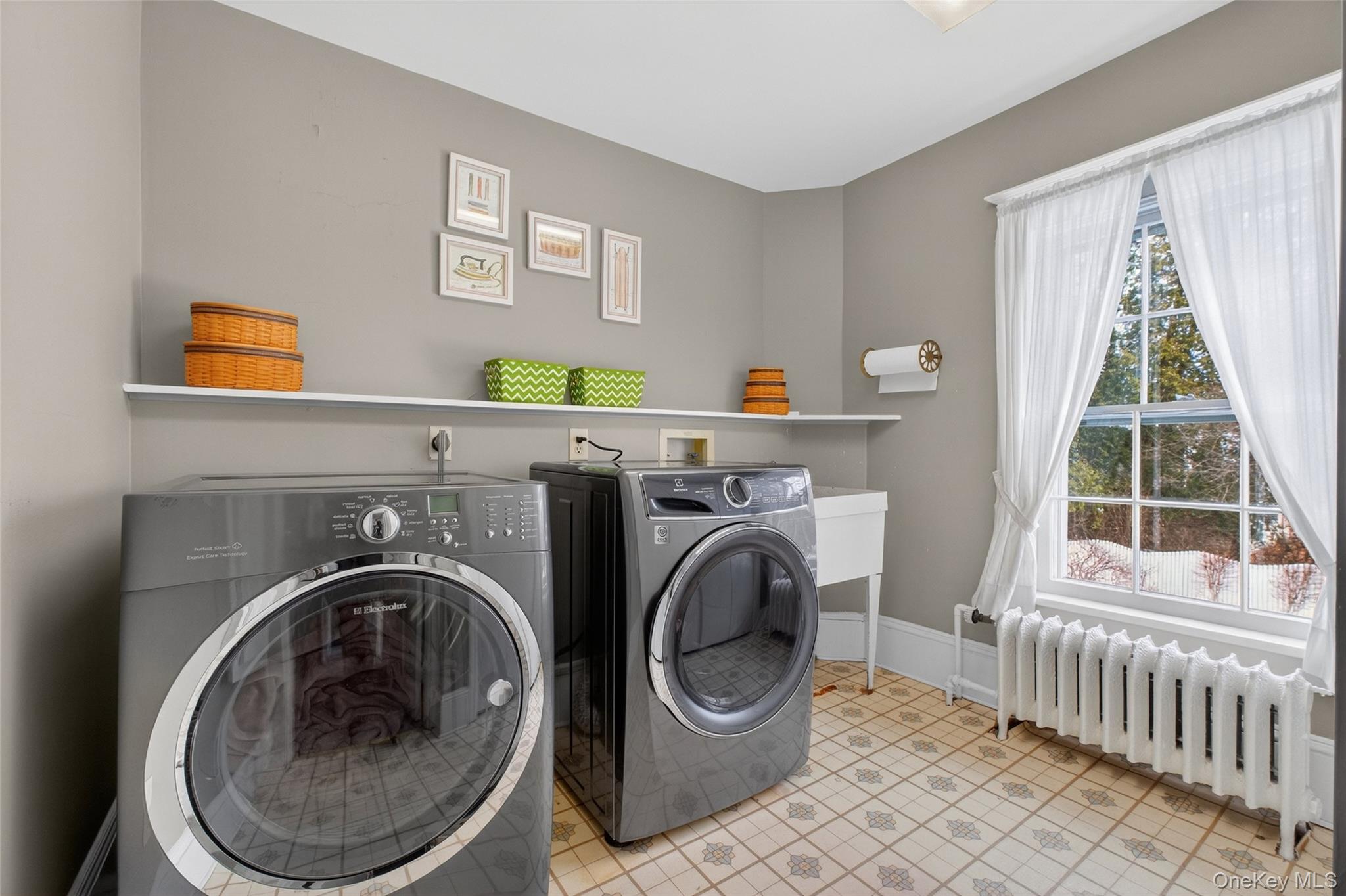 79 Old Balmville Road Newburgh, NY 12550 - Photo 34 of 44 a utility room with dryer and washer