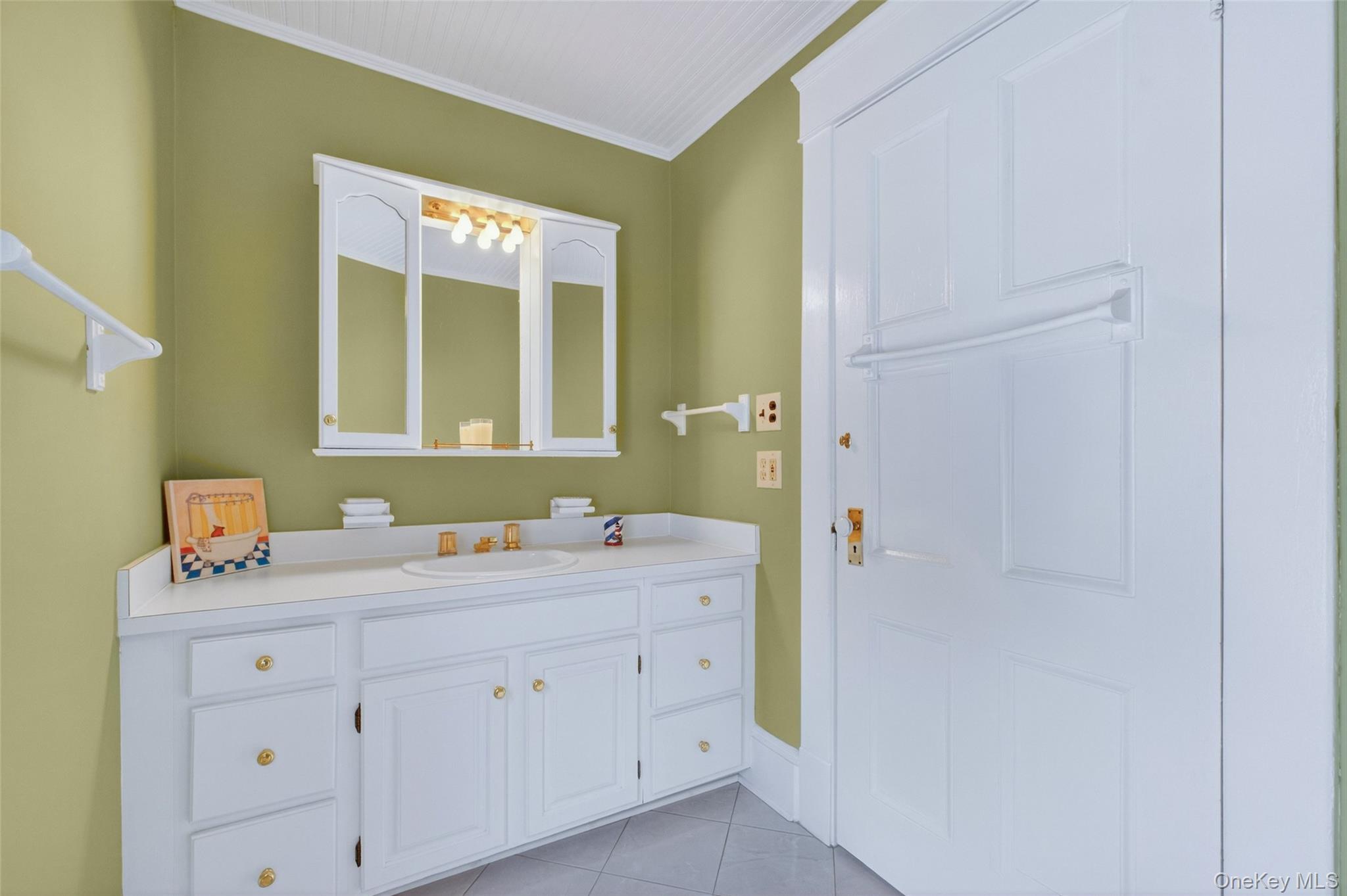79 Old Balmville Road Newburgh, NY 12550 - Photo 36 of 44 a bathroom with a sink a mirror and a shower