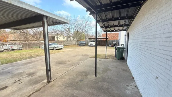 a view of a backyard of a house