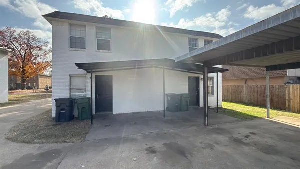 a view of an empty room with a garage