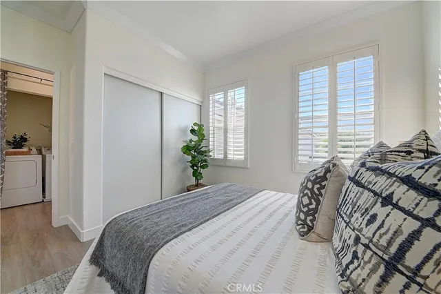 a view of a patio with couches and potted plants