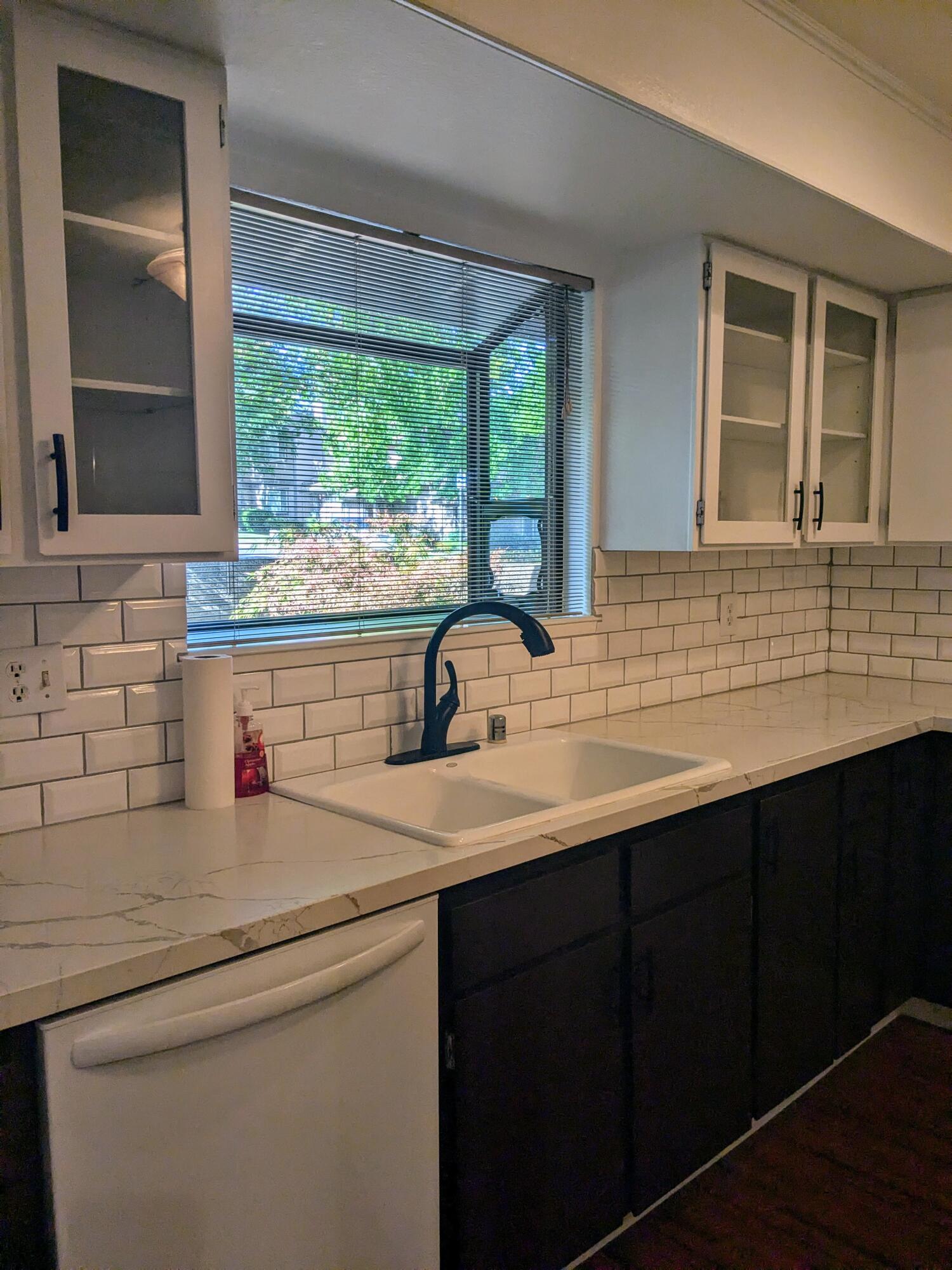 1974 Bechelli Lane Redding, CA 96002 - Photo 15 of 49 a kitchen with a sink and a window