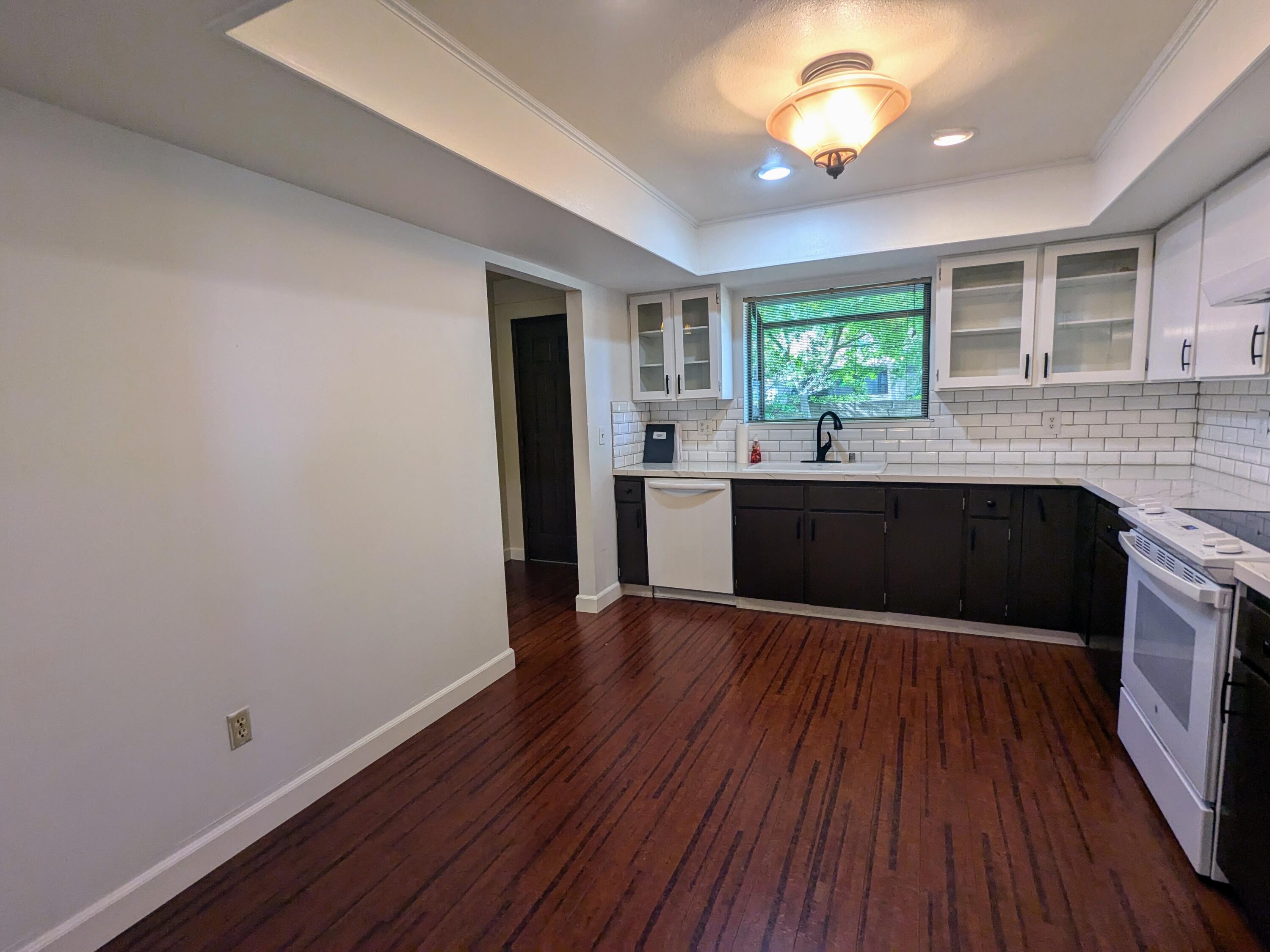 1974 Bechelli Lane Redding, CA 96002 - Photo 20 of 49 a view of kitchen with sink and wooden floor