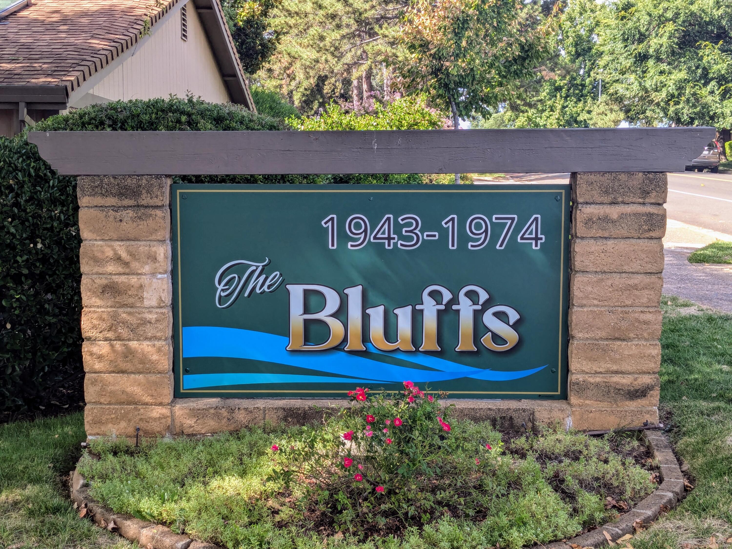 1974 Bechelli Lane Redding, CA 96002 - Photo 2 of 49 a sign that is on a brick wall