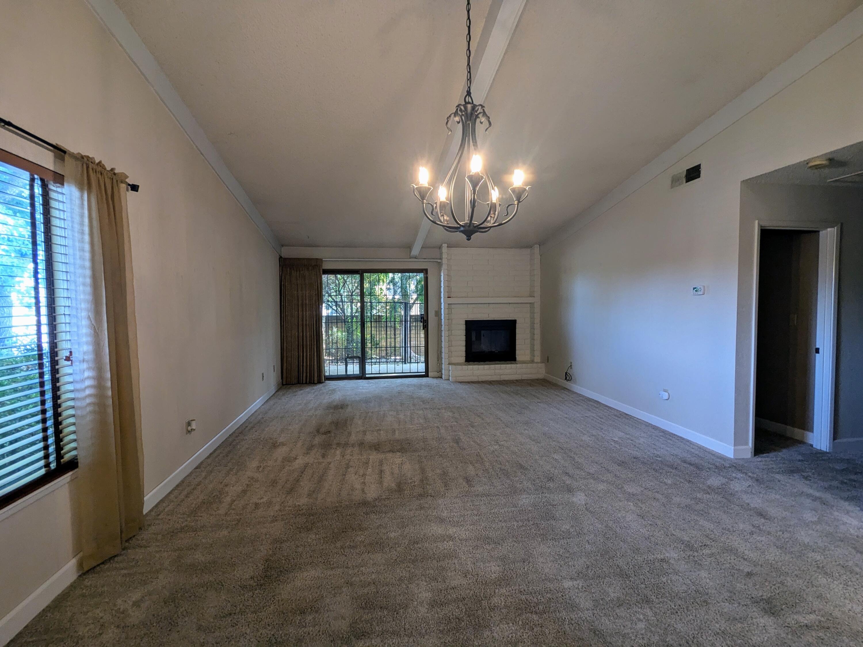 1974 Bechelli Lane Redding, CA 96002 - Photo 24 of 49 a view of empty room with a fireplace
