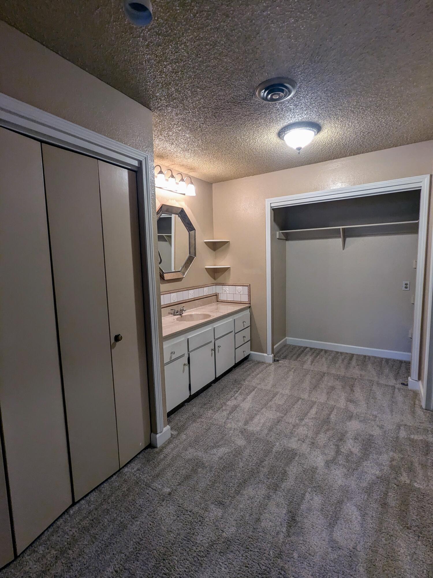1974 Bechelli Lane Redding, CA 96002 - Photo 38 of 49 a view of a storage & utility room with washer and dryer