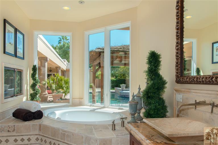 70551 Sunny Lane Rancho Mirage, CA 92270 - Photo 19 of 35 a view of a house with backyard and porch