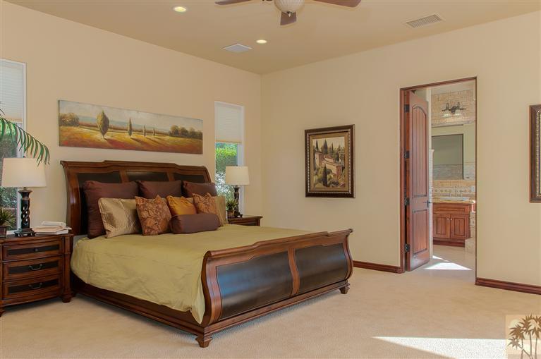 70551 Sunny Lane Rancho Mirage, CA 92270 - Photo 20 of 35 a bedroom with a bed and ceiling fan