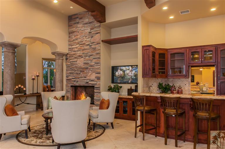 70551 Sunny Lane Rancho Mirage, CA 92270 - Photo 3 of 35 a living room with fireplace furniture and a large window